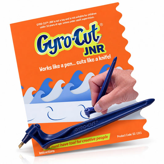 Gyro-Cut JNR swivel craft knife with its blade, in front of its packaging