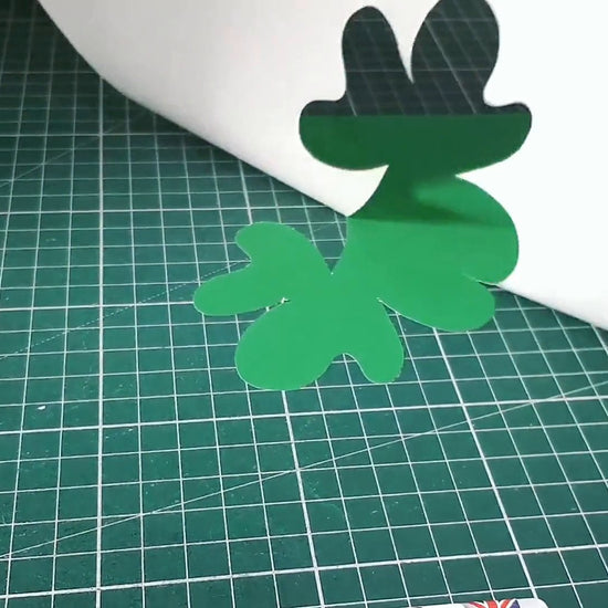 Real cut: the Gyro-Cut JNR cutting a clover shape in green card