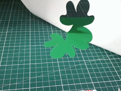 Real cut: the Gyro-Cut JNR cutting a clover shape in green card